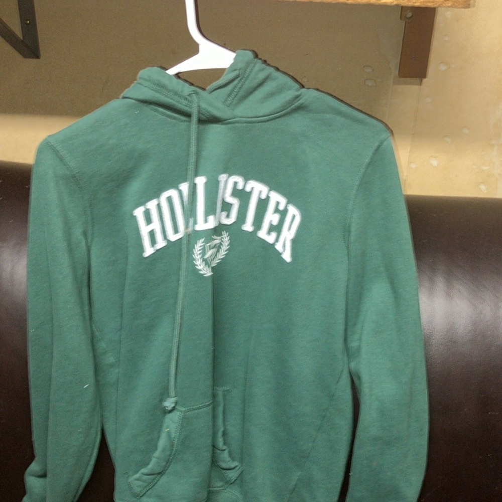 hollister green hoodie, washed not every worn.  not a v- neck, new to this